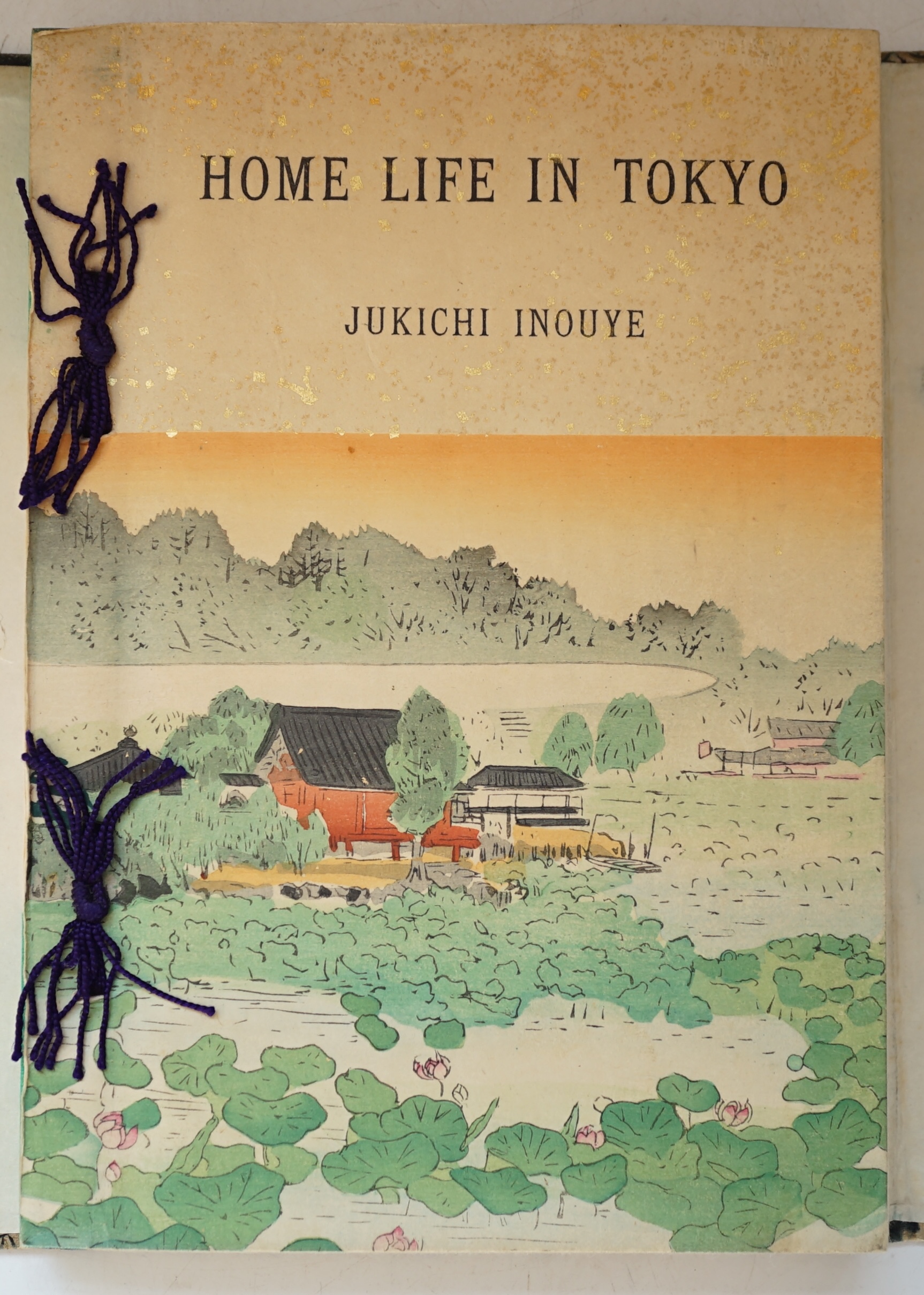 Inouye, Jukichi - Home Life in Tokyo. 1st edition, 8vo, colour woodblock frontispiece, numerous woodblock drawings. Publisher’s pictorial colour woodblock printed covers, stitched with cotton ties, front cover top right